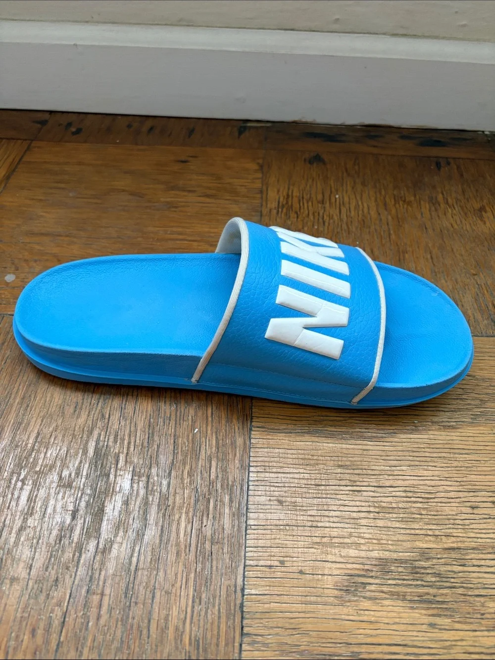 Nike Men’s Light Blue Slide Sandals with White NIKE Logo